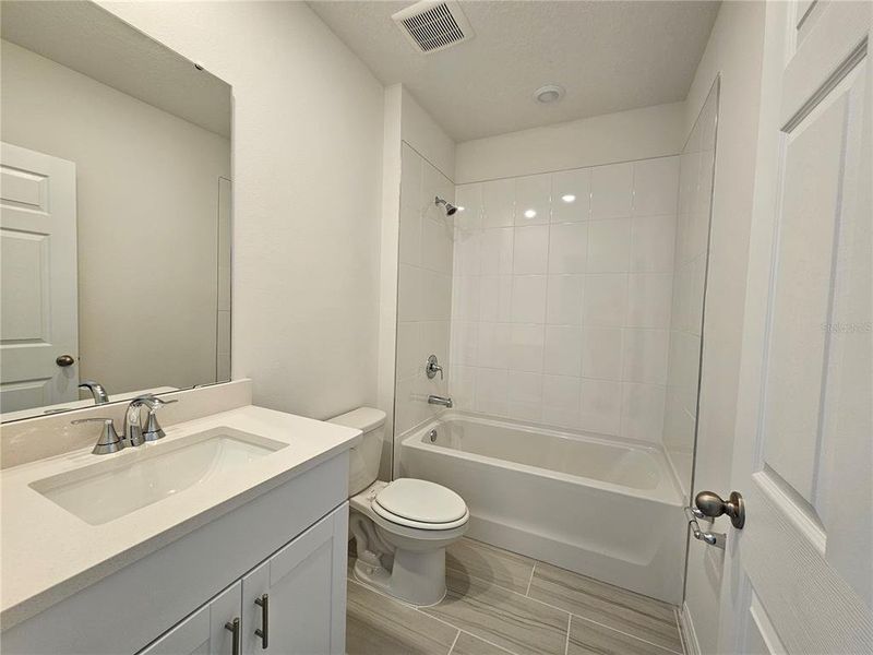 Furnished interior view inside a new home in Lawson Dunes - Signature Series, Haines City (Image 8).