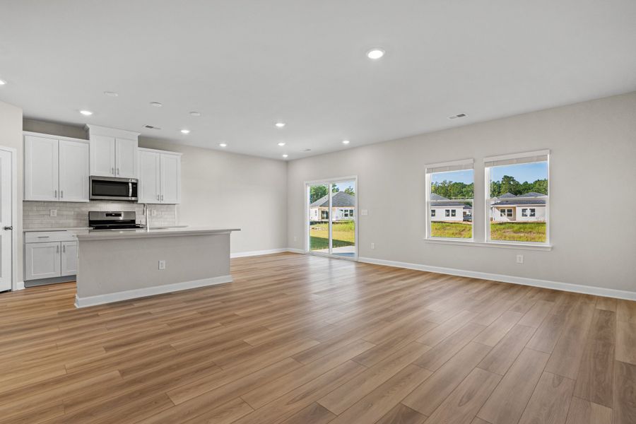 Spacious, unfurnished interior of a new home in Cypress Ridge - The Boardwalk Series, Longs (Image 14).