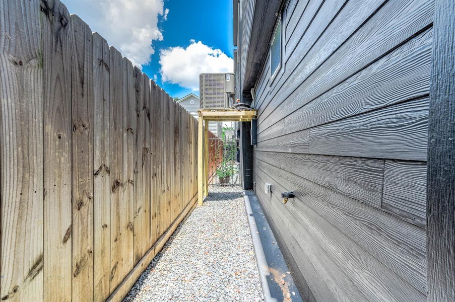 Exterior details and patio area of a home in , Houston (Image 3). Exterior details and patio area of a home in , Houston (Image 3).