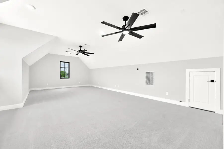 Upstairs extra room with a full bath.