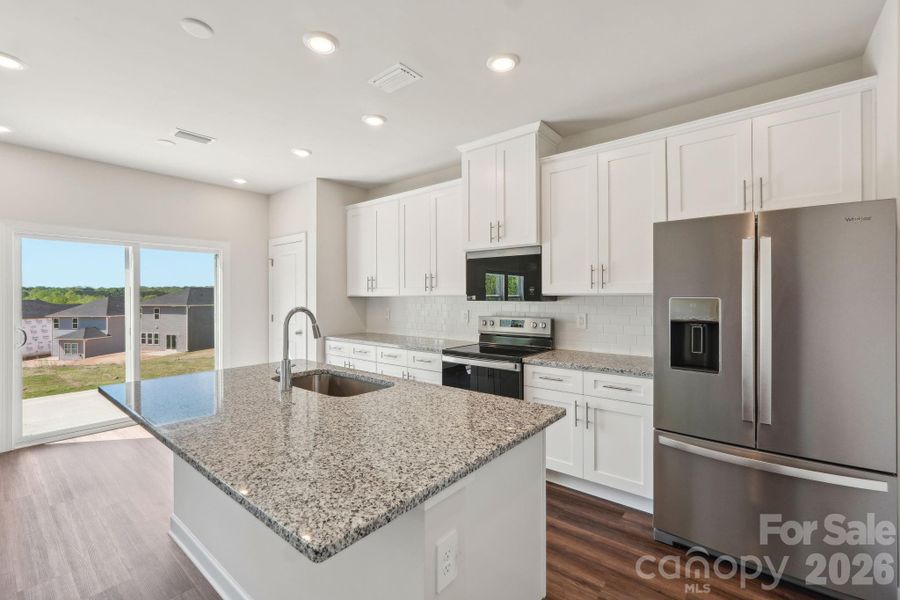 Photo is not of the actual home, but is an inspirational photo of builder’s model home and may depict options, furnishings, and/or decorator features that are not included