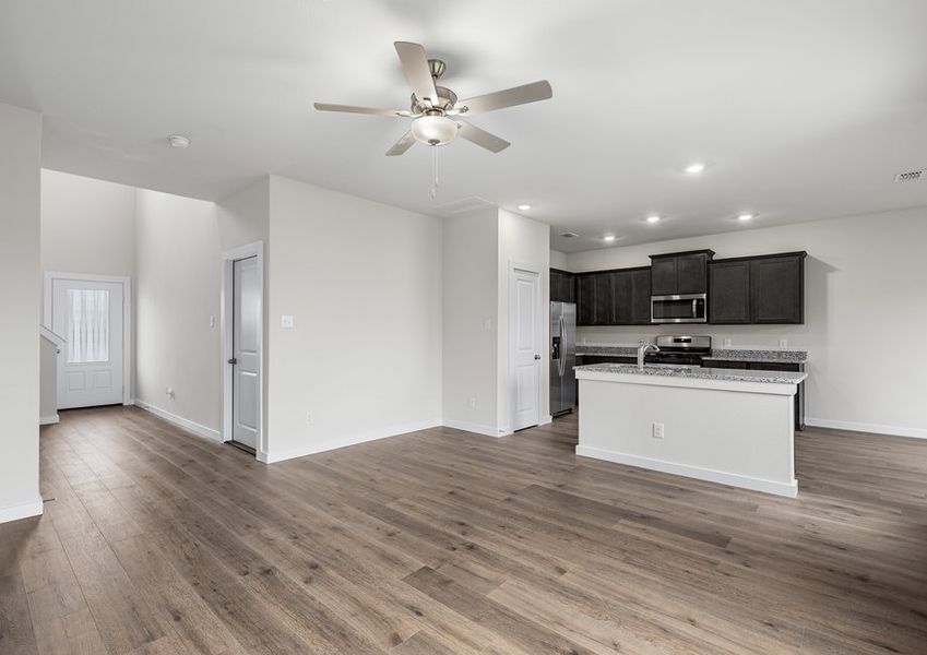 The family room sits right off of the kitchen. The family room sits right off of the kitchen.