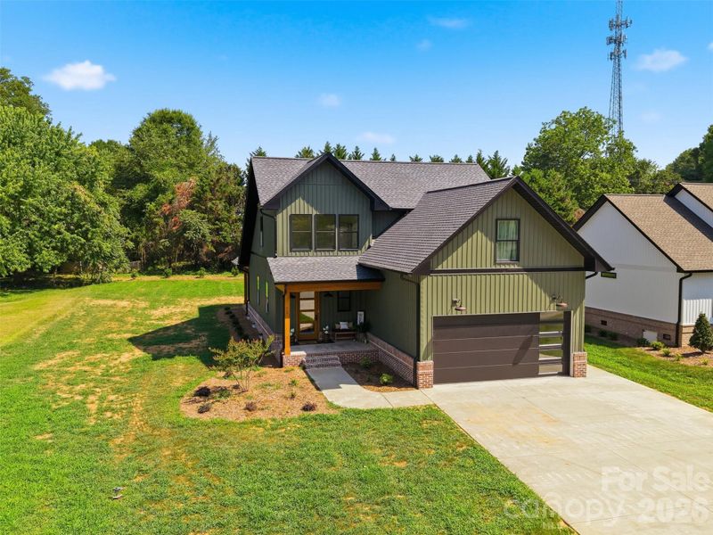 Front exterior of a new home in , Taylorsville, NC, highlighting curb appeal (Image 29). Front exterior of a new home in , Taylorsville, NC, highlighting curb appeal (Image 29).