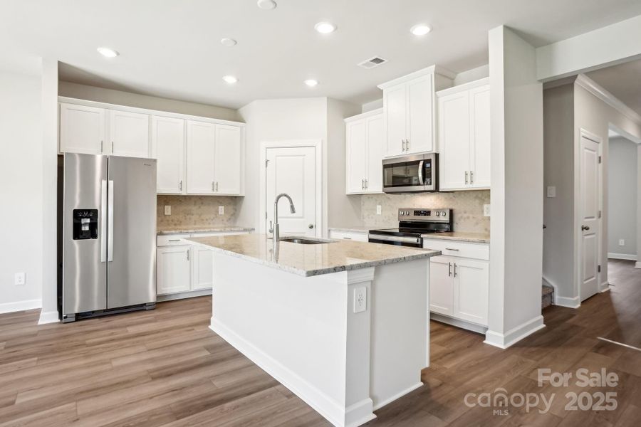 Photo is not of the actual home, but is an inspirational photo of builder’s model home and may depict options, furnishings, and/or decorator features that are not included Photo is not of the actual home, but is an inspirational photo of builder’s model home and may depict options, furnishings, and/or decorator features that are not included