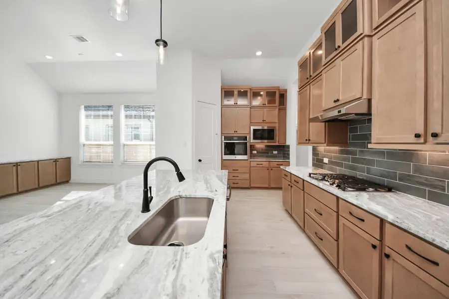 Furnished interior view inside a new home in Beacon Point, Texas City (Image 7).
