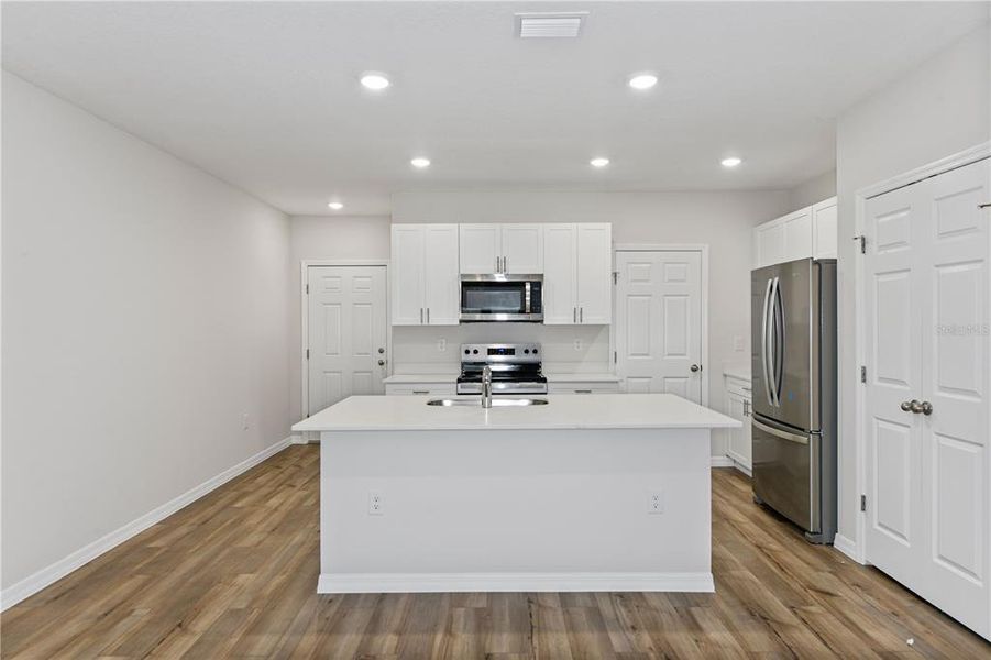Furnished interior view inside a new home in Grove at Crosswind, Haines City (Image 9).