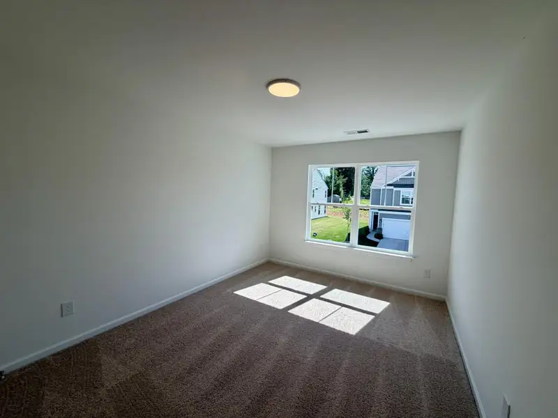 Spacious, unfurnished interior of a new home in Bellevue Townhomes, Greenville (Image 10). Spacious, unfurnished interior of a new home in Bellevue Townhomes, Greenville (Image 10).