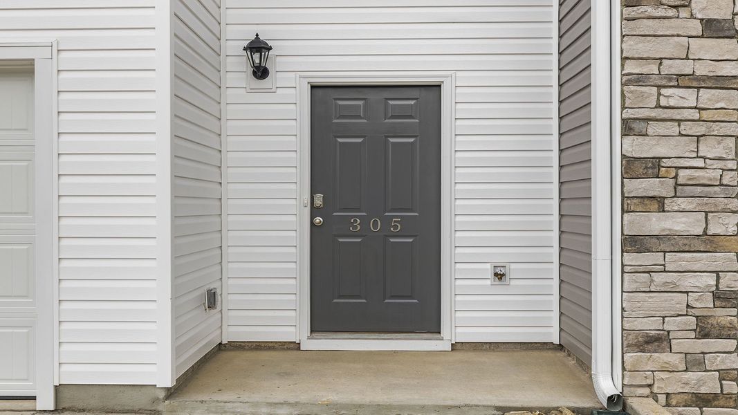 Exterior details and patio area of a home in Covington Village, Greer (Image 3).