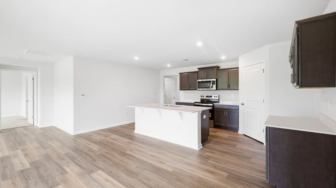 Furnished interior view inside a new home in Lakestone, Woodruff (Image 10).