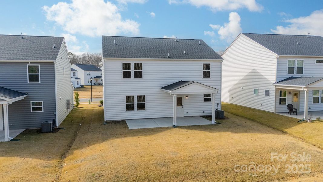Exterior details and patio area of a home in Stewarts Landing, Charlotte (Image 21).