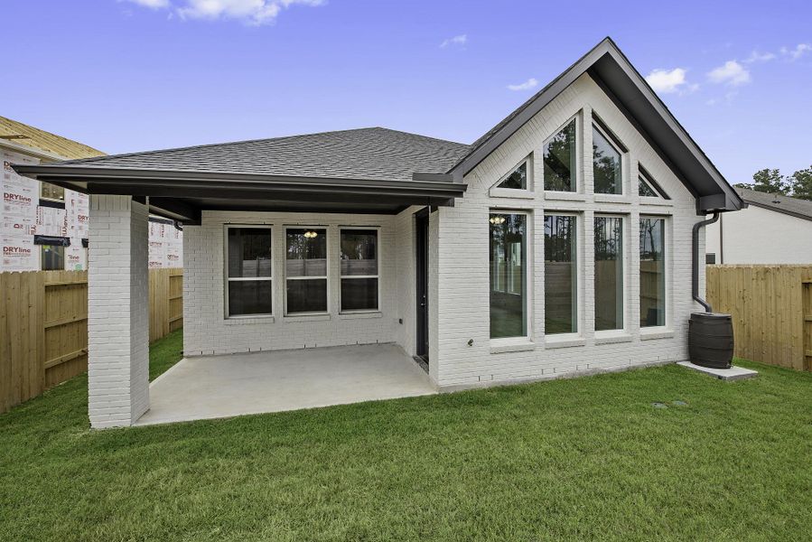Exterior details and patio area of a home in ARTAVIA®, Conroe (Image 3).