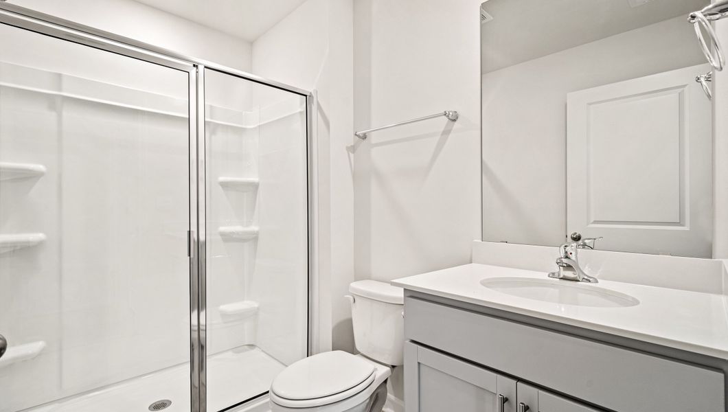 Furnished interior view inside a new home in Paddock Point, Roebuck (Image 10).