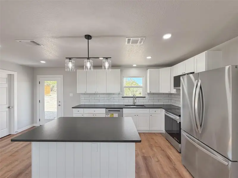 Furnished interior view inside a new home in , Spring Branch (Image 10).