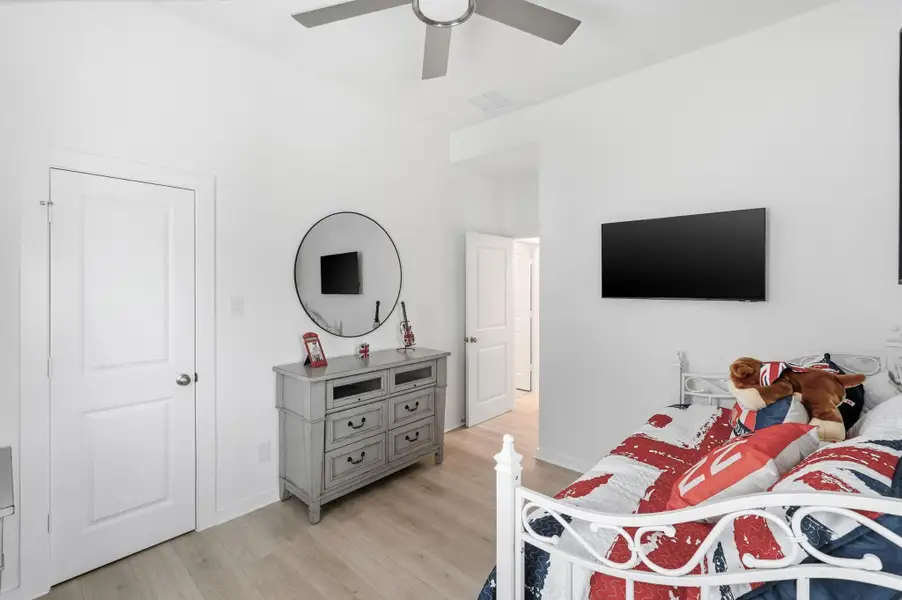 Furnished interior view inside a new home in Bridgeland Central, Cypress (Image 17).