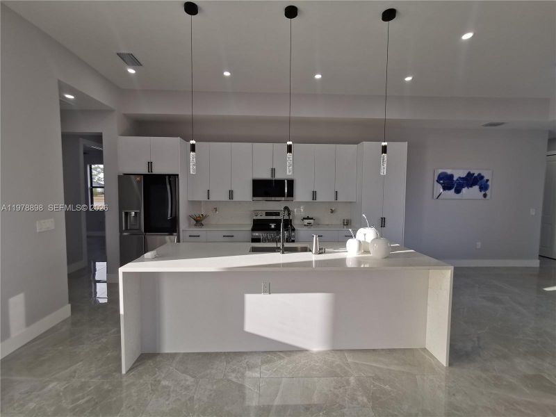 Furnished interior view inside a new home in , Cape Coral (Image 9).