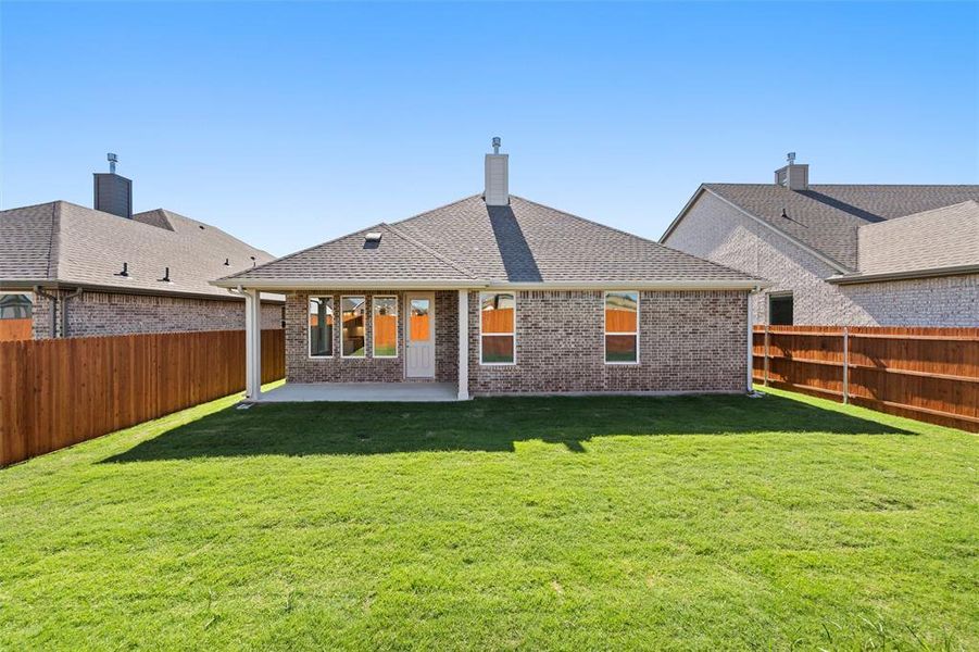 Exterior details and patio area of a home in Morningstar, Aledo (Image 20).