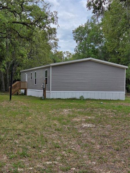 Exterior details and patio area of a home in , Spring Hill (Image 19).
