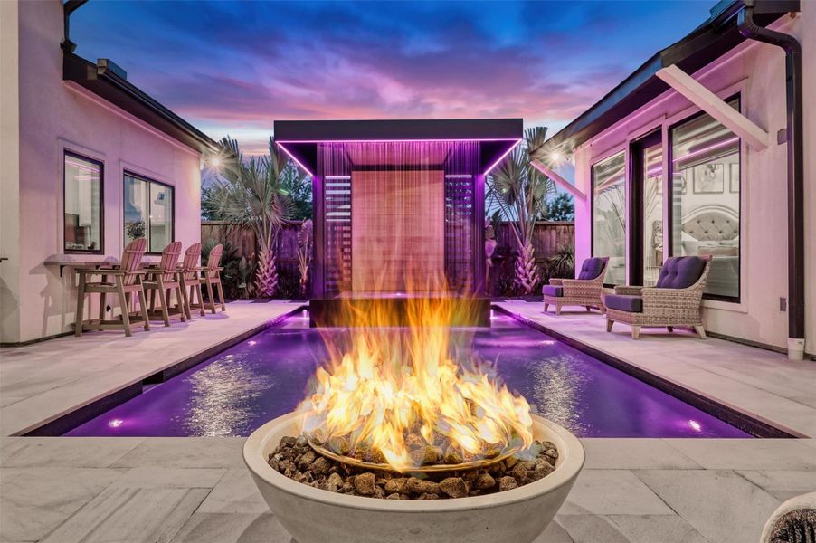 The only thing hotter than this gas-lit fire pit is this pool!