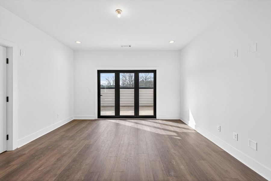 Spacious, unfurnished interior of a new home in Skyview On Broad, Sugar Hill (Image 33). Spacious, unfurnished interior of a new home in Skyview On Broad, Sugar Hill (Image 33).