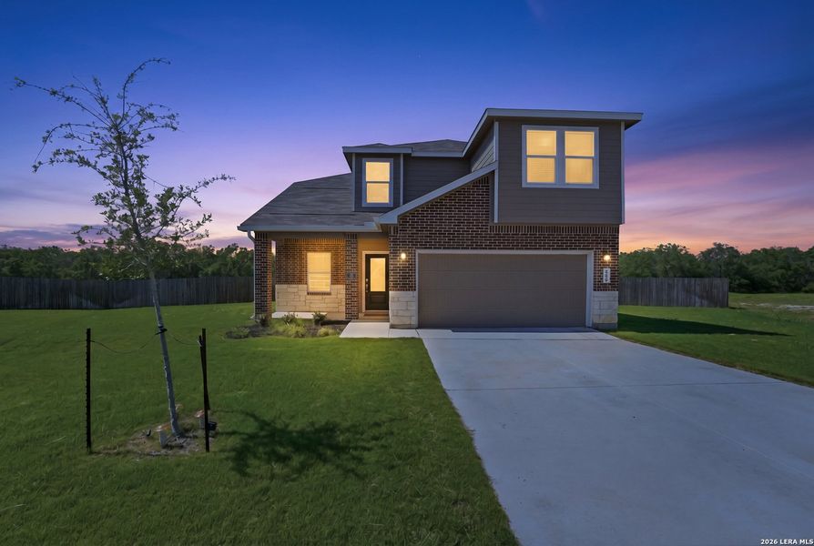 Front exterior of a new home in Guadalupe Heights, Seguin, TX, highlighting curb appeal (Image 22).