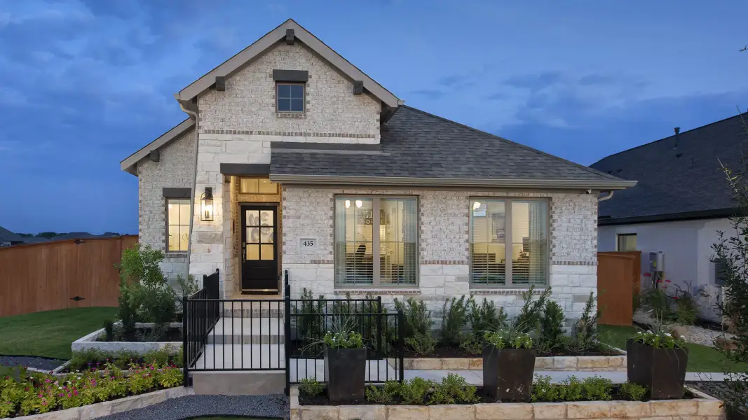 Front exterior of a new home in Austin Point, Richmond, TX, highlighting curb appeal (Image 2). Front exterior of a new home in Austin Point, Richmond, TX, highlighting curb appeal (Image 2).