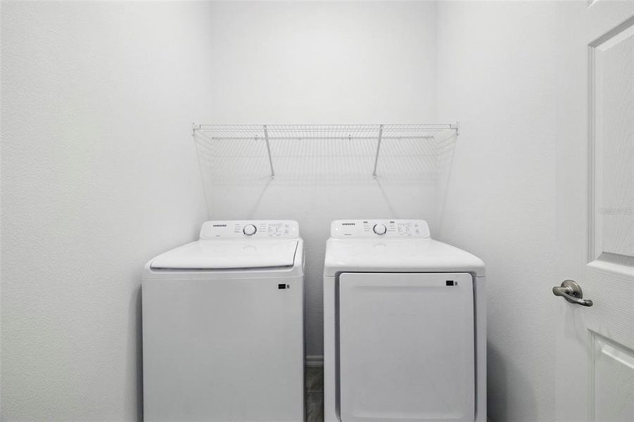 Furnished interior view inside a new home in Eagletail Landings, Howey-in-the-Hills (Image 8).