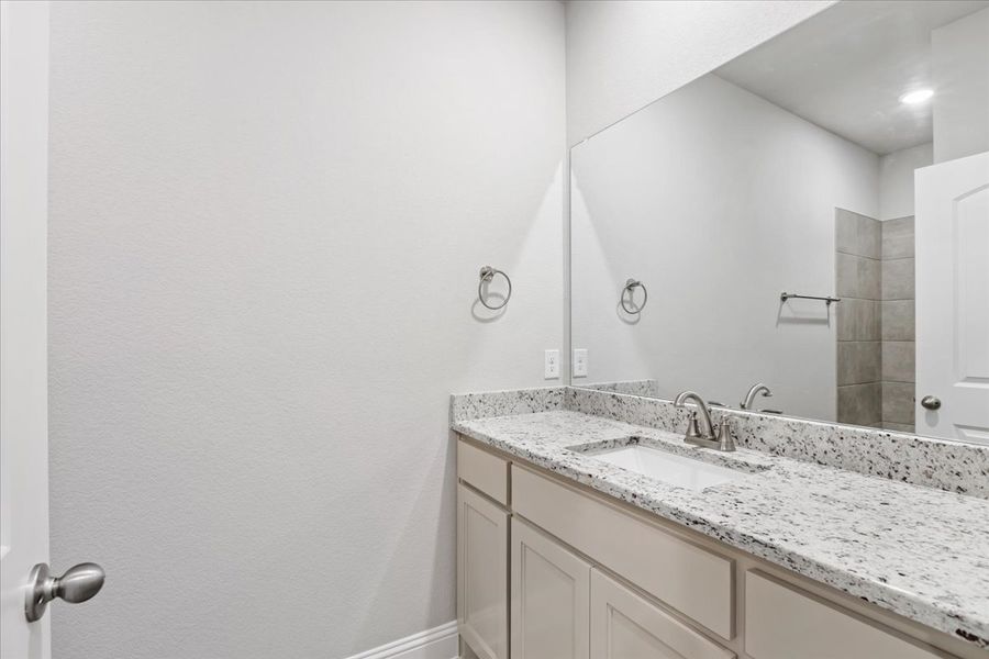 Representative furnished interior of a home built from the The Sapphire Ranch II by Doug Parr Custom Homes in Spring Valley Ranch, Paradise (Image 11).