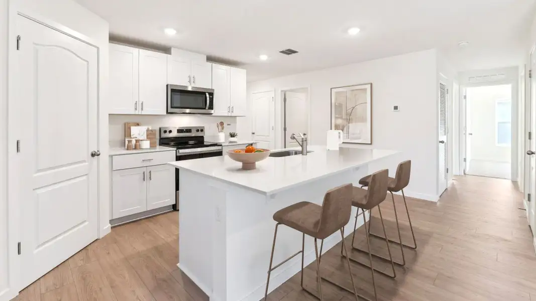 Furnished interior view inside a new home in Sunside at Ormond Station, Ormond Beach (Image 3).