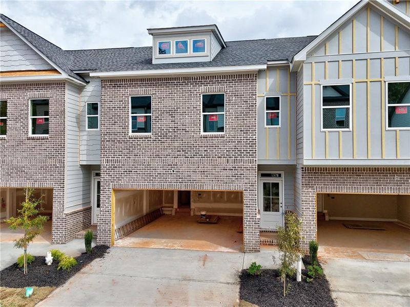 Exterior details and patio area of a home in , Tucker (Image 1).