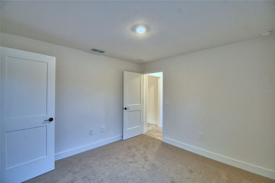 Spacious, unfurnished interior of a new home in Cadence Crossing, Auburndale (Image 41).