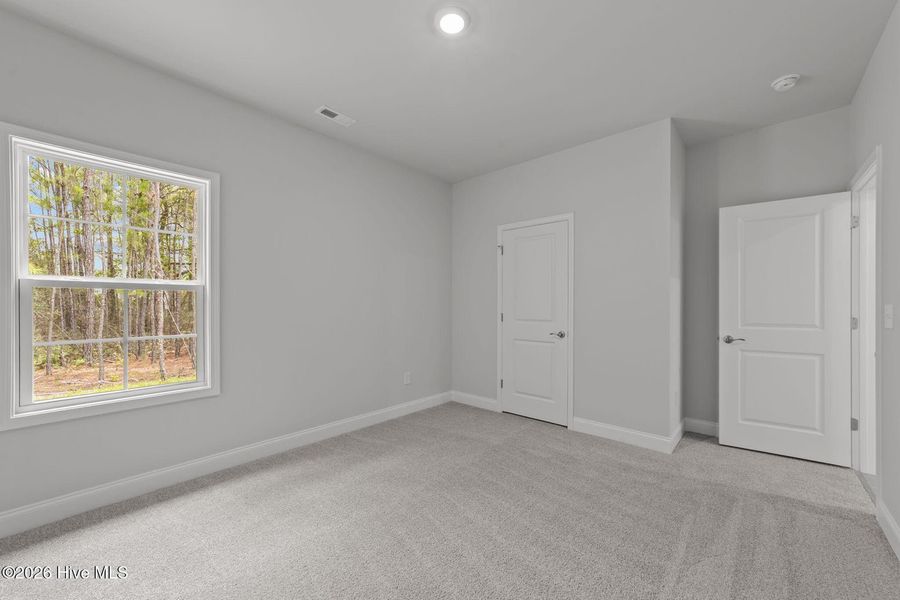 Spacious, unfurnished interior of a new home in Wood Creek, Leland (Image 18). Spacious, unfurnished interior of a new home in Wood Creek, Leland (Image 18).