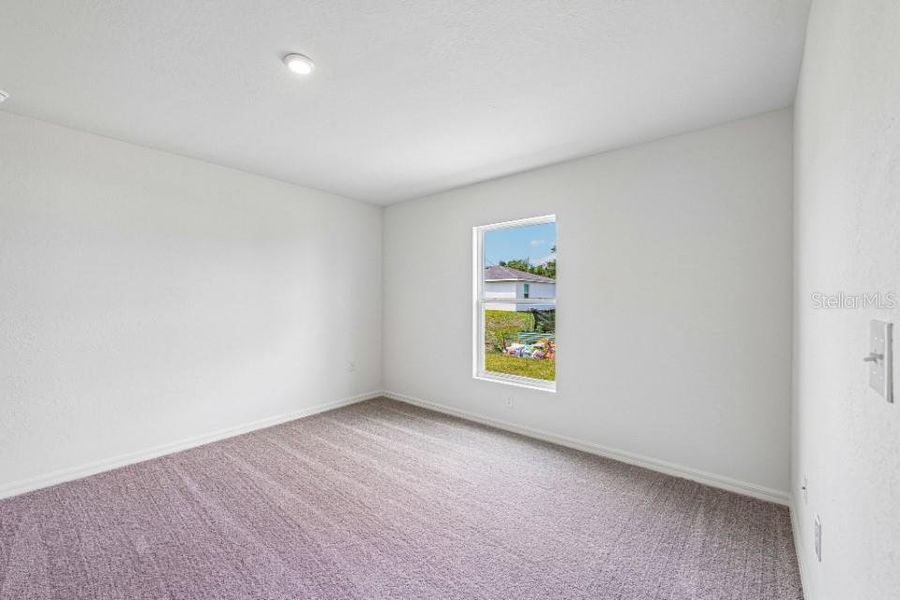 Spacious, unfurnished interior of a new home in Lehigh Acres Classic, Lehigh Acres (Image 9).