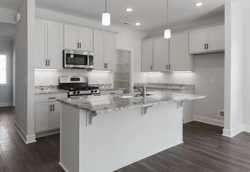Representative furnished interior of a home built from the The Ivory by Cothran Homes in Holly Ridge, Greenville (Image 7).