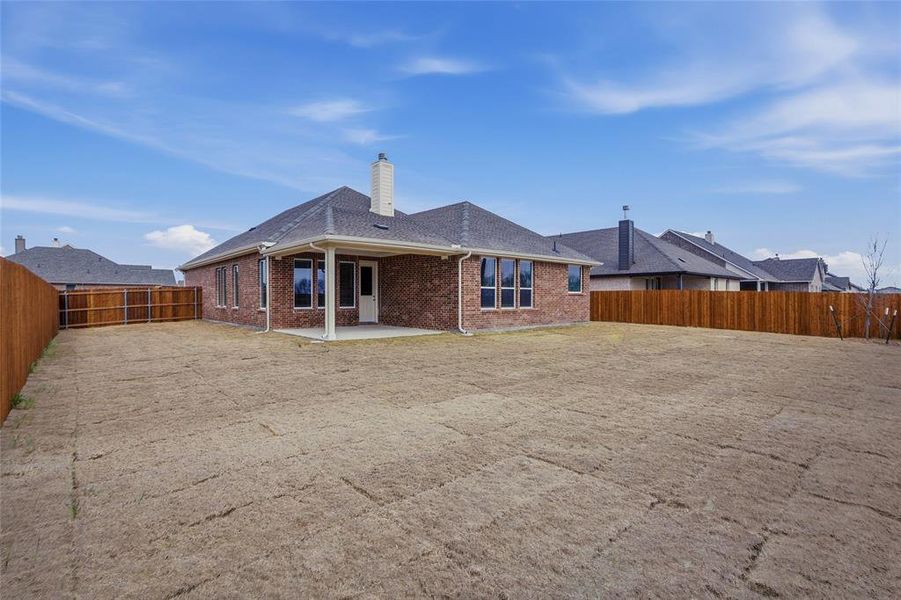 Exterior details and patio area of a home in Aero Vista, Caddo Mills (Image 23).