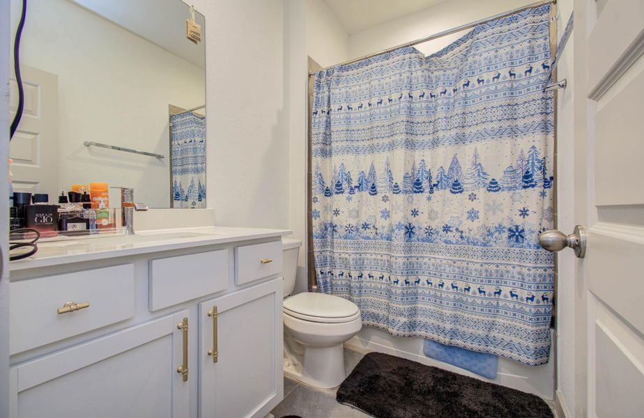 Furnished interior view inside a new home in Parks Edge, Missouri City (Image 14).