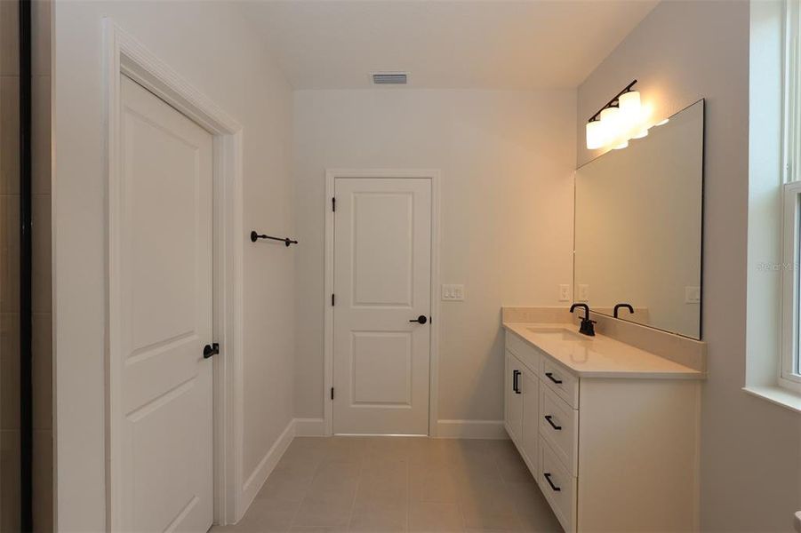 Furnished interior view inside a new home in Lake Star at Ovation, Winter Garden (Image 10).