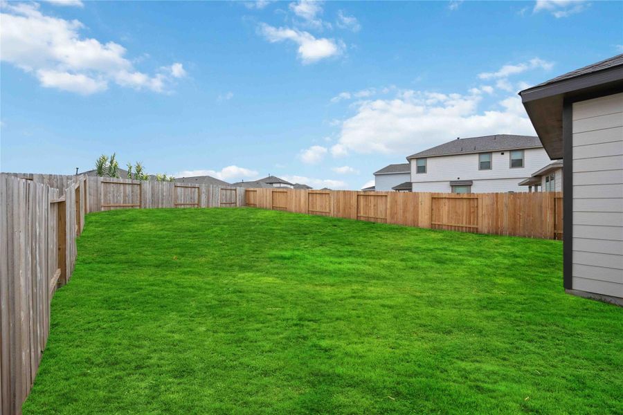 Exterior details and patio area of a home in Bluestem, Brookshire (Image 3). Exterior details and patio area of a home in Bluestem, Brookshire (Image 3).