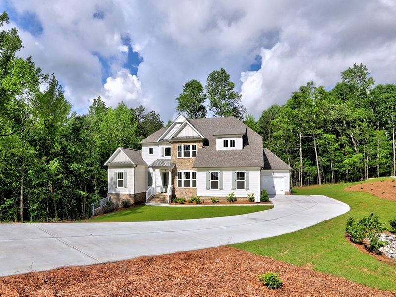 Front exterior of a new home in , Cumming, GA, highlighting curb appeal (Image 24). Front exterior of a new home in , Cumming, GA, highlighting curb appeal (Image 24).
