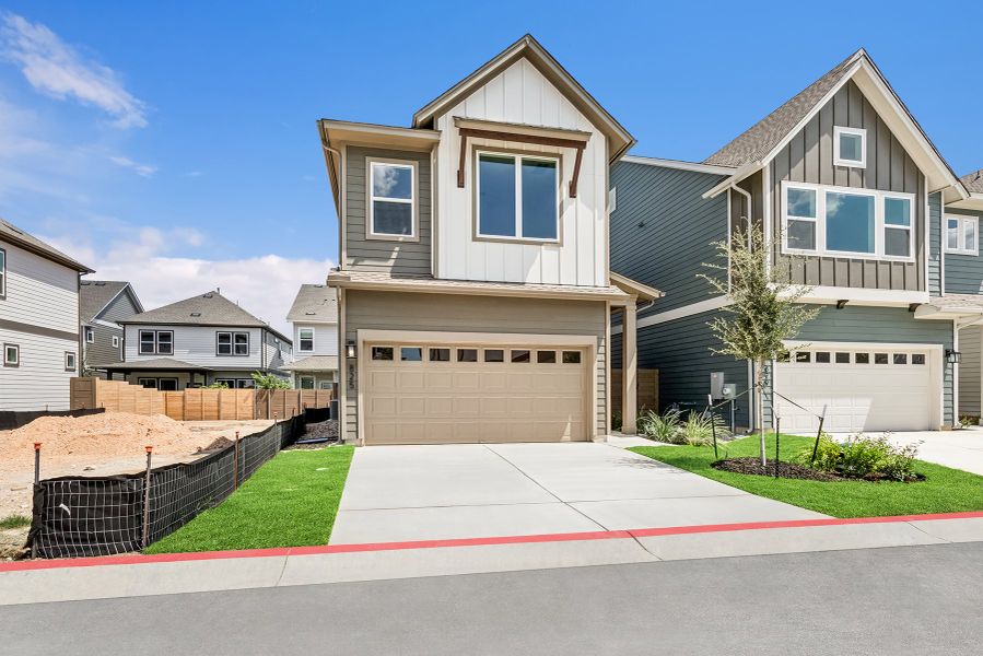 Front exterior of a new home in Double Creek Crossing – City Home Series, Round Rock, TX, highlighting curb appeal (Image 1). Front exterior of a new home in Double Creek Crossing – City Home Series, Round Rock, TX, highlighting curb appeal (Image 1).