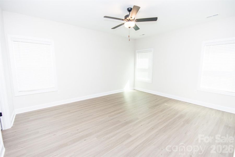 Spacious, unfurnished interior of a new home in Colonial Crossing, Troutman (Image 25).