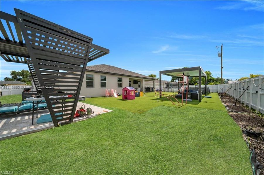 Front exterior of a new home in , Cape Coral, FL, highlighting curb appeal (Image 18). Front exterior of a new home in , Cape Coral, FL, highlighting curb appeal (Image 18).