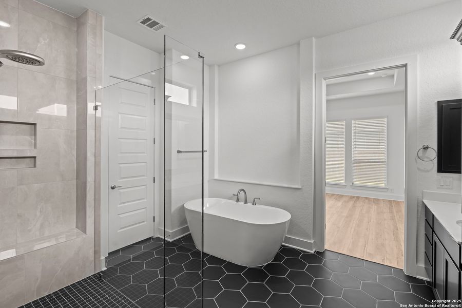 Furnished interior view inside a new home in Mesa Western, Cibolo (Image 15). Furnished interior view inside a new home in Mesa Western, Cibolo (Image 15).