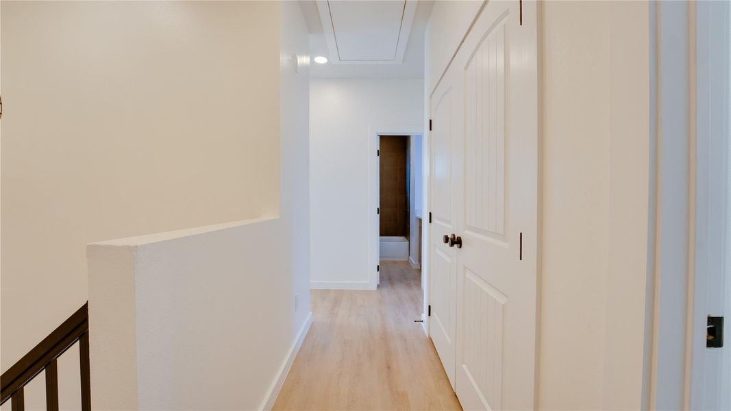 Laundry room in hallway on the right