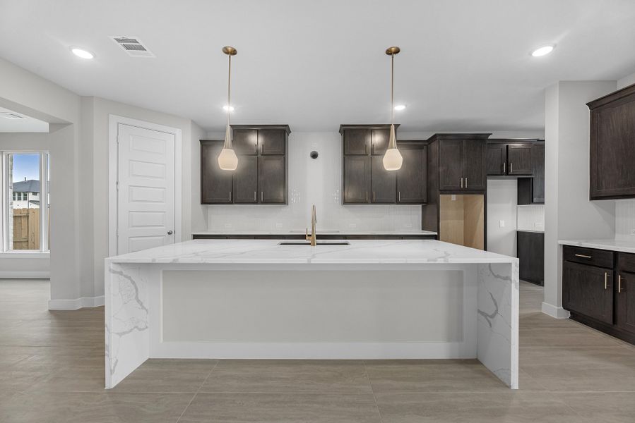 Furnished interior view inside a new home in Wolf Ranch, Georgetown (Image 3).