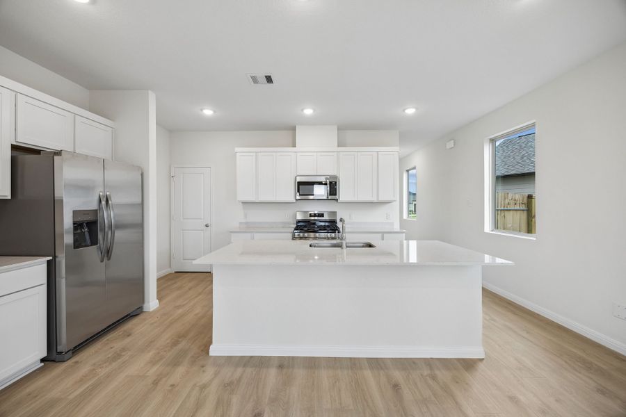 Furnished interior view inside a new home in Riviera Pines, Huffman (Image 15).