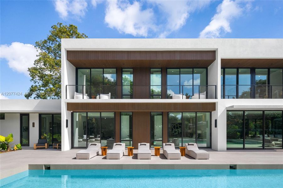 Condo located in Pinecrest, FL showcasing its design and architecture (Image 6). Condo located in Pinecrest, FL showcasing its design and architecture (Image 6).