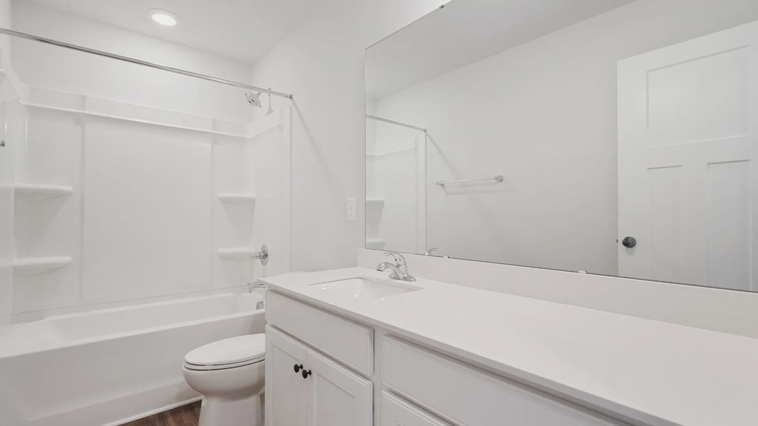 Representative furnished interior of a home built from the Stonefield - Finished Basement by DRB Homes in Pinebrook, Woodruff (Image 32).