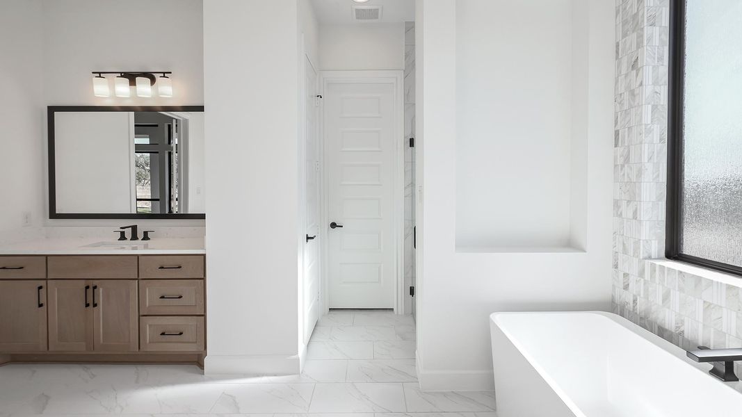 Furnished interior view inside a new home in The Preserve at Elm Creek, New Braunfels (Image 12).