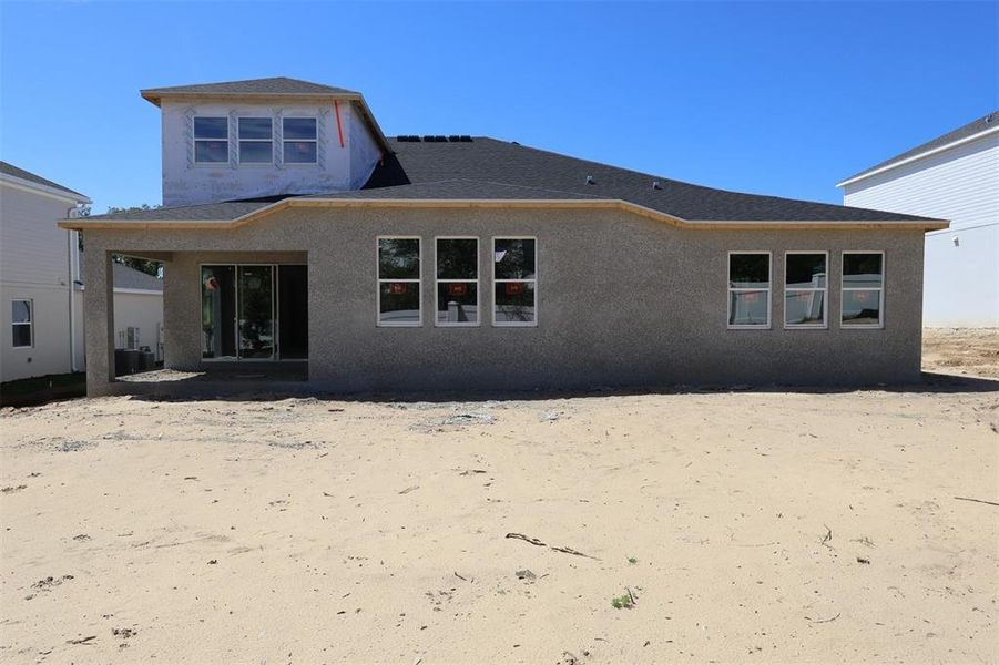 Exterior details and patio area of a home in Wolf Lake Ranch, Apopka (Image 3).