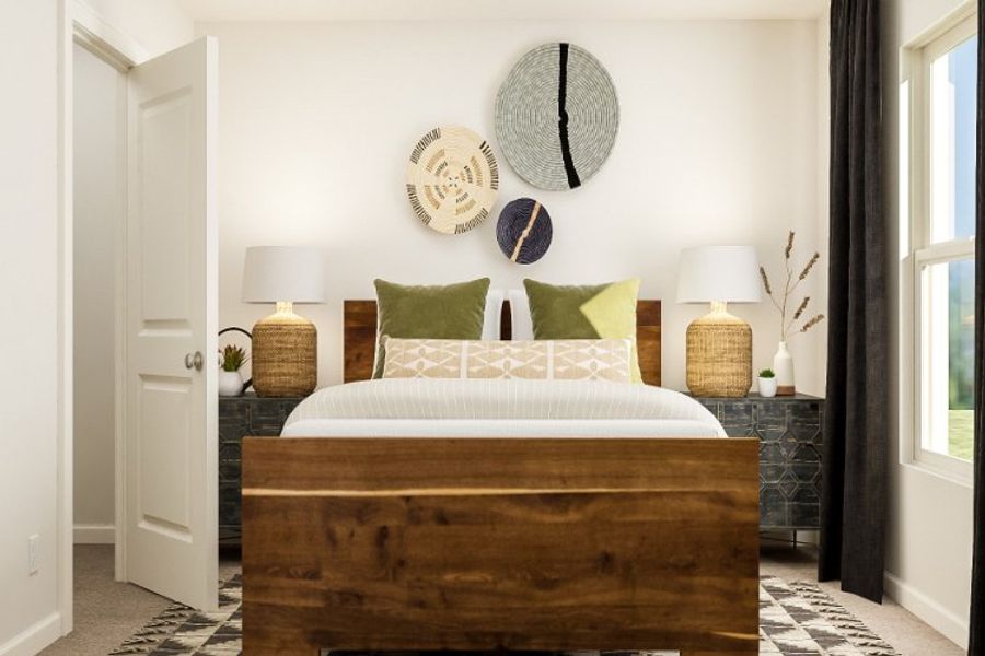 A bed with green pillows.